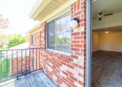 Thumbnail 29 of 35 - view into living room from balcony at Bradford Run in Kokomo, IN