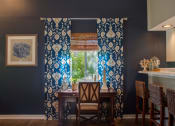 Thumbnail 12 of 35 - counter top in kitchen with blue curtains at Bradford Run in Kokomo, IN