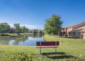 Thumbnail 7 of 35 - bench next to pond in apartment community at Bradford Run in Kokomo, IN