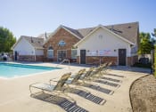 Thumbnail 2 of 15 - swimming pool and sundeck with lounge chairs at Northlake Farms Apartments, Illinois