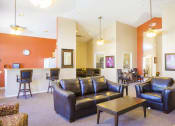 Thumbnail 3 of 15 - clubhouse lounge with couches at Northlake Farms Apartments, Gurnee, IL