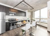 Thumbnail 8 of 33 - Very open kitchen area with great views at Lakeview 3200 Apartments, Chicago, 60657