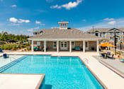 Thumbnail 9 of 12 - Clubhouse and pool at McHenry Square Apartments, Augusta, GA