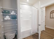 Thumbnail 7 of 12 - Shower and linen closet at McHenry Square Apartments, Georgia