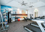 Thumbnail 11 of 12 - Fitness center with treadmill at McHenry Square Apartments, Augusta, GA, 30909