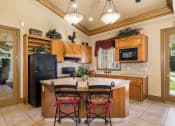 Thumbnail 18 of 30 - Breakfast Bar-Dining Room at Dartmouth Tower at Shaw, California, 93612