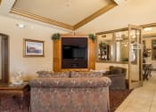Thumbnail 20 of 30 - Lounge Area With TV at Dartmouth Tower at Shaw, Clovis, CA, 93612