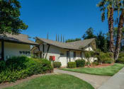 Thumbnail 12 of 16 - Courtyard With Green Space at Reef Apartments, Fresno, California