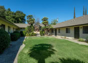 Thumbnail 13 of 16 - Lush Green Outdoors at Reef Apartments, Fresno