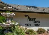 Thumbnail 2 of 16 - Property Signage at Reef Apartments, Fresno, 93704