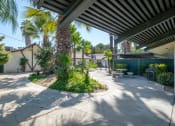 Thumbnail 9 of 16 - Outdoor Grill With Intimate Seating Area at Reef Apartments, Fresno, 93704