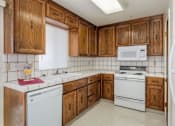 Thumbnail 26 of 30 - Modern Kitchen With Custom Cabinet at Scottsmen Too Apartments, Clovis, 93612