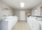 Thumbnail 30 of 30 - Laundry Center at Scottsmen Too Apartments, California, 93612