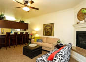 Thumbnail 5 of 7 - Modern Living Room With Kitchen View at Villa Faria Apartments, Fresno, CA