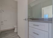 Thumbnail 5 of 30 - Bathroom Vanity and Bathtub