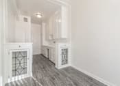 Thumbnail 2 of 6 - Kitchen area with built-in in glass display