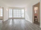 Thumbnail 3 of 6 - Living room with large windows