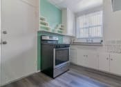 Thumbnail 6 of 13 - Kitchen new floors and appliances