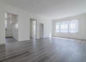 Thumbnail 8 of 13 - Living area with 3 large windows and view