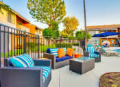 Thumbnail 3 of 36 - Pool Side Lounge Area at Pacific Trails Luxury Apartment Homes, Covina, California