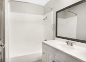 Thumbnail 31 of 36 - Oval Tub With Combo Shower at Pacific Trails Luxury Apartment Homes, Covina, CA