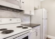 Thumbnail 27 of 36 - All Electric Kitchen In White at Pacific Trails Luxury Apartment Homes, California, 91722