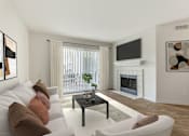 Thumbnail 22 of 30 - Living Room With TV at The Apartments at Tamar Meadow, Maryland