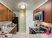 Thumbnail 34 of 35 - Kitchen at The Apartments at Owings Run, Maryland