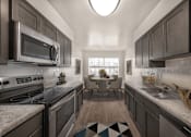 Thumbnail 4 of 35 - Kitchen with mosaic tiles and cabinets at The Apartments at Owings Run, Maryland, 21117