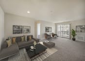 Thumbnail 8 of 35 - Living with couch and table at The Apartments at Owings Run, Owings Mills, Maryland