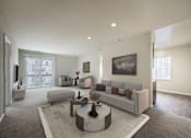 Thumbnail 6 of 35 - Living with couch and table and tv at The Apartments at Owings Run, Owings Mills