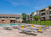 Thumbnail 2 of 27 - Poolside Relaxing Chairs at The Apartments at Saddle Brooke, Cockeysville, MD