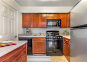 Thumbnail 14 of 27 - Furnished Kitchen at The Apartments at Saddle Brooke, Cockeysville, 21030