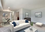 Thumbnail 12 of 27 - Living Area With Dining at The Apartments at Saddle Brooke, Cockeysville