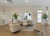 Thumbnail 12 of 44 - Clubhouse Lounge at The Apartments at Canterbury, Rosedale, Maryland