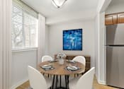Thumbnail 28 of 44 - Staged Dinning at The Apartments at Canterbury, Maryland
