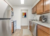 Thumbnail 26 of 44 - Fully Equipped Kitchen With Modern Appliances at The Apartments at Canterbury, Maryland, 21237