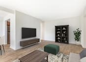 Thumbnail 34 of 44 - Living Room With TV at The Apartments at Canterbury, Rosedale, 21237