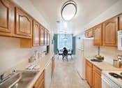 Thumbnail 31 of 44 - Furnished Kitchen at The Apartments at Canterbury, Rosedale, MD