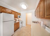 Thumbnail 32 of 44 - Fully Furnished Kitchen at The Apartments at Canterbury, Rosedale, 21237