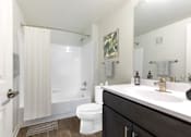 Thumbnail 20 of 40 - Bathroom With Bathtub at The Apartments at Cambridge Court, Rosedale, Maryland