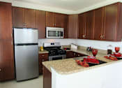 Thumbnail 11 of 40 - Kitchen at The Apartments at Cambridge Court, Rosedale, 21237