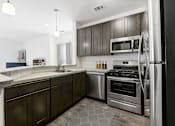 Thumbnail 5 of 40 - Stainless Steel Appliances at The Apartments at Cambridge Court, Rosedale, 21237
