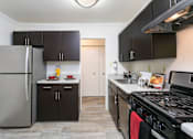 Thumbnail 13 of 39 - Kitchen with wooden closet at Annapolis Roads, Maryland , 21403