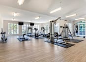 Thumbnail 7 of 39 - Fitness Center With Outside View at Annapolis Roads, Annapolis, MD