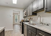 Thumbnail 12 of 39 - Modern Kitchen With Custom Cabinet at Annapolis Roads, Annapolis, MD, 21403