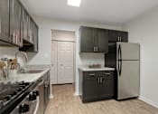Thumbnail 11 of 39 - Modern Kitchen With Stainless Steel Appliances And Double Door Refrigerators at Annapolis Roads, Annapolis, 21403