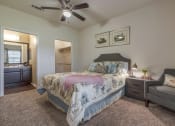 Thumbnail 15 of 44 - Apartments in Spring TX - Edgewater at Klein - Spacious Bedroom with Plush Carpeting, Private Bathroom and Large Closet