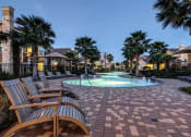 Thumbnail 19 of 45 - Night View Of Pool at Avenues at Tuscan Lakes, Texas, 77573