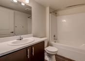 Thumbnail 16 of 19 - bathroom sink and tub at GATEWAY BY VINTAGE, Spanaway, WA
